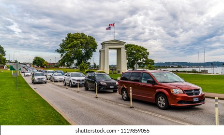 Vancouver-Blaine Hwy, Surrey, British Columbia, Canada. 06. 24. 2018. Long Line Up Cars At The Canada - US Peace Arch Border Crossing.