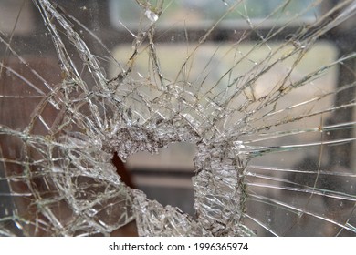 Vandalism, Destroyed Glass On A Construction Machine 