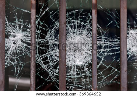Vandalized Broken Business Store Glass Window