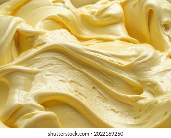 Vanila flavour gelato - full frame detail. Close up of a beige surface texture of vanilla Ice cream.