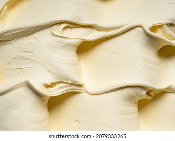 Vanila flavour gelato - full frame detail. Close up of a beige surface texture of vanilla Ice cream.