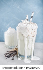 Vanilla Bean Milkshake. Glass With Cold Vanilla Milkshake With Vanilla Beans, Copy Space