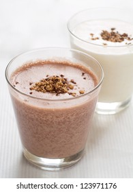 Vanilla And Chocolate Milkshakes In Glass, Selective Focus