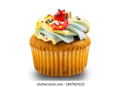 Vanilla Cup Cake Garnished With Butter Cream Frosting And Colorful Sprinkles Isolated On White Background With Clipping Path.