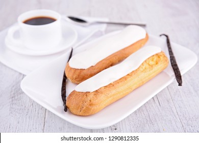 Vanilla Eclair And Coffee Cup