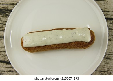 Vanilla Eclair On A Plate