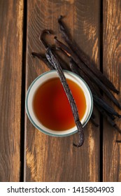 Vanilla Extract On Wooden Surface