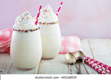 Vanilla funfetti milkshake with whipped cream and sprinkles