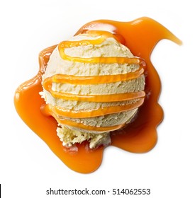 vanilla ice cream with caramel sauce isolated on white background, top view
