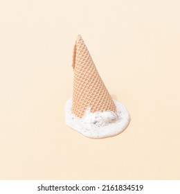 Vanilla Ice Cream Melting On A Cream Background. Sweet Food Summer Concept For Hot Summer Day. Monochromatic Pastel Colors.