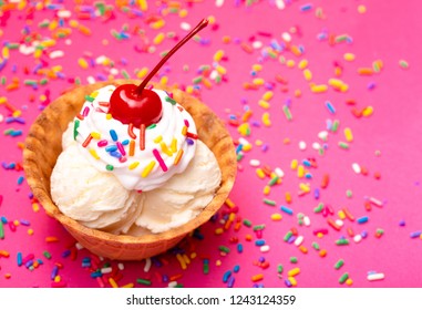 Vanilla Ice Cream in a Waffle Cone Bowl wiht a Cherry on Top