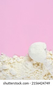 Vanilla Protein Powder Scoop On Pink Background. Egg Powder, Soy And Whey Powder, Casein Supplements.