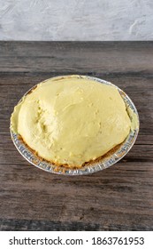 Vanilla Pudding Pie With Graham Cracker Crust In Tin Pie Pan