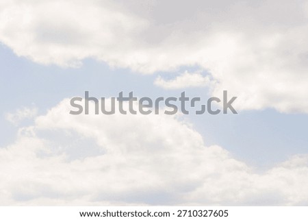 Vanilla sky clouds background in Cloud Dancer color with calm atmosphere. Color of the year 2026