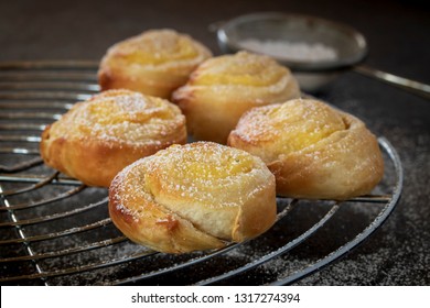 Vanilla Snails From Puff Pastry On A Cake Rack