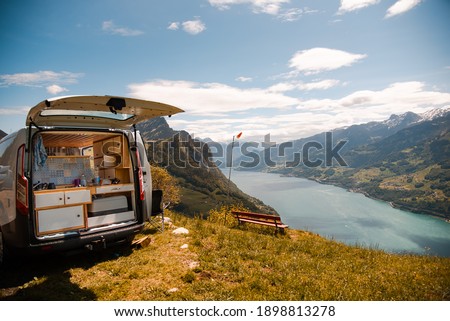 Vanlife - Camping Van on a mountain in Switzerland