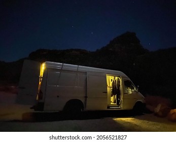 Vanlife Living. Shot Of Mecesdes Sprinter Van At Night. Camping Under The Night Sky. Camper Van. 