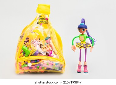 VANSBR, SWEDEN - Mar 23, 2022: A Bendable Rubber Doll And Backpack By The Brand Betty Spaghetti Isolated By A Gray Background 