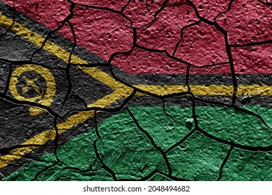 Vanuatu flag on a mud texture of dry crack on the ground