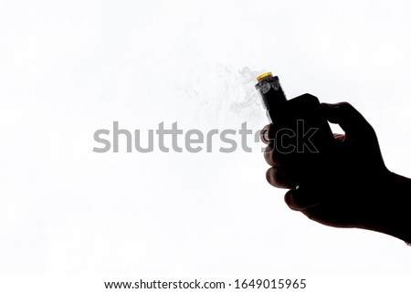 Vape mod e-cig for help quit smoking tobacco with rdta on white background silhouette shape and smoke