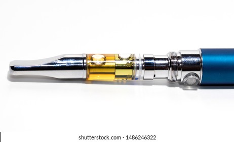 Vape Pen and Cannabis Oil on White Background. 