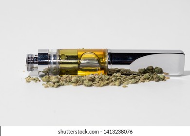 Vape Pen Disposable Cartridge With Cannabis Oil And Marijuana Bud 