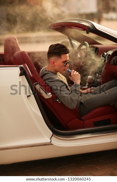 vape, smoke, smoker, guy, man, cigarette. success,\
successful, luxury, Young. Sexy rich. Bentley. supercar, car, super\
car. Attractive. Comfort, male. Lux, Vehicle driver. Auto. nice,\
handsome, drive.