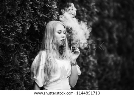 Similar – Image, Stock Photo Pretty blond girl with long hair smoking