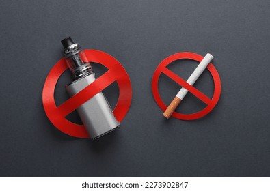 Vaping device and Cigarette with a prohibition sign on dark background. Smoking ban