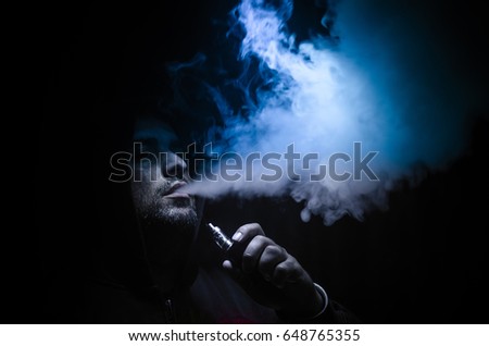 Similar – Image, Stock Photo Black man exhaling cloud of smoke on street