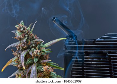 Vaporizing Cannabis Concept Shot. Vaporizer Mouth Piece And Plant Bud With A Smoke.