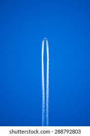 vapour trails left by a high flying jet