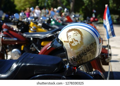 Varadero, Cuba. 02/07/2014 Gathering Bikers In The City Of Varadero In Cuba. A Cuban Biker Helmet Is Lying On The Seat Of A Motorcycle. The Portrait Of Che Guevara Is Depicted On A Helmet. Editorial.