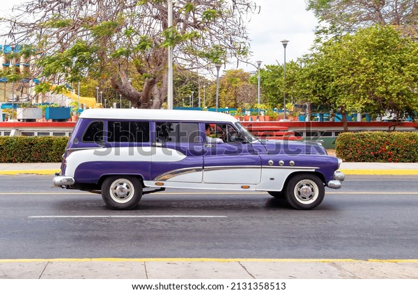 Varadero, Matanzas, Cuba - July 22, 2019: Old vintage\
classic car. These kind of vehicles are traditional in the Cuban\
streets. 
