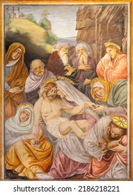 VARALLO, ITALY - JULY 17, 2022: The renaissance fresco Pieta - Jesus deposed from the cross in the church Chiesa Santa Maria delle Grazie  by Gaudenzio Ferrari (1513).