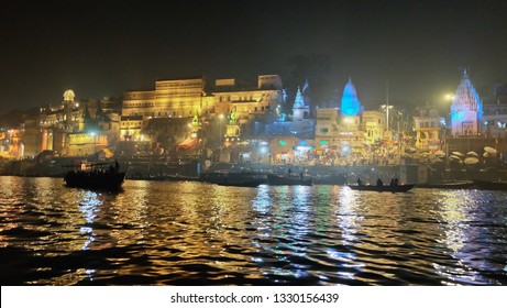 Varanasi, Banaras, Uttar Pradesh, India - February 16,2019: A boat parked in the Ganges River,Varanasi.Hindu holy city on Ganges Ganga