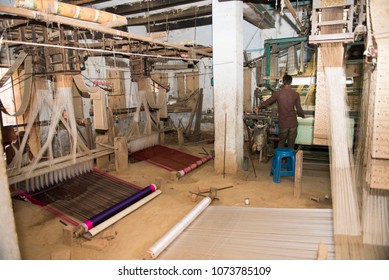 Varanasi / India 26 March 2018 A Weaver Working On Handloom In A Work Shed At Varanasi  Uttar Pradesh India