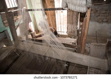 Varanasi / India 26 March 2018 A Weaver Working On Handloom In A Work Shed At Varanasi  Uttar Pradesh India