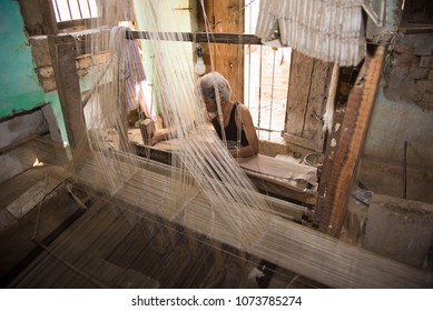 Varanasi / India 26 March 2018 A Weaver Working On Handloom In A Work Shed At Varanasi  Uttar Pradesh India