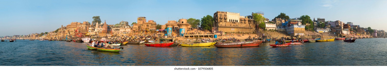  Varanasi / India 29 March 2018 Panorama View Across The Holy River Ganges On Dashashwamedh Ghat   At Varanasi  Uttar Pradesh India