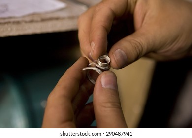 VARANASI, INDIA - MAY: Unidentified Jeweler Making Jewelry (ring). Handwork. May 15, 2015 in Varanasi, India. According to legend, Varanasi was founded by Lord Shiva - Powered by Shutterstock