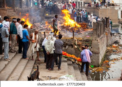 Varanasi, India/April 12, 2015: Cremation at Manikarnika Ghat which is on the banks of River Ganges in Varanasi, Banaras, Kashi, Uttar Pradesh, India.