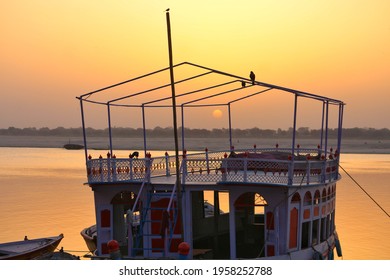 In Varanasi Sunrise With The Holy Ganga River And Beautiful Bird