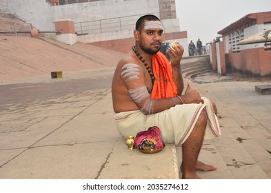 Varanasi,UP,01 14 2020: A Pilgrim And Hindu Devotee Enjoying Hot Tea On Winter Morning At Benares Ghat.