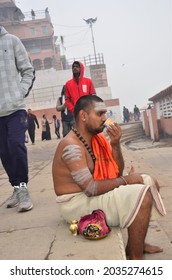 Varanasi,UP,01 14 2020: A Pilgrim And Hindu Devotee Enjoying Hot Tea On Winter Morning At Benares Ghat.