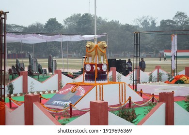 Varanasi,Uttar Prades,India-Jan 26 2021: Close Up Shot Of Indian National Emblem And Golden Loin Capital With Garland On The Occasion Of Republic Day With Selective Focus. Varanasi Police Reserve.