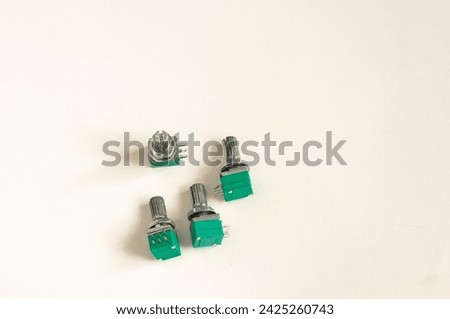 Variable resistor isolated on white background. Electronic parts concept. potentiometer.