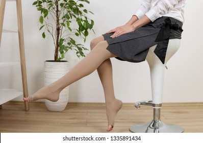 Varicose veins prevention, Compression tights, relief for tired legs. Beautiful long female legs in stockings