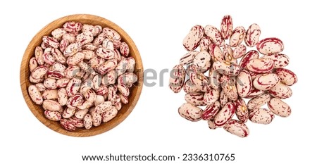 variegated kidney bean in wooden bowl isolated on white background. Top view. Flat lay