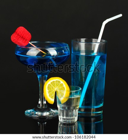 a variety of alcoholic drinks isolated on black